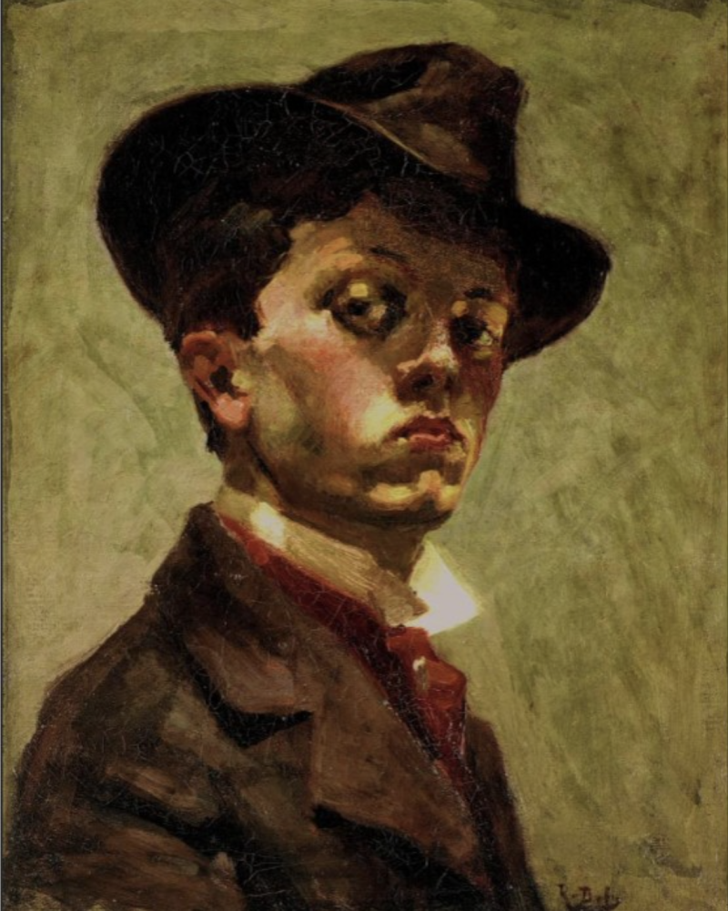 Self-portrait of a young man wearing a dark hat and coat, gazing intently with a neutral expression against a light background.